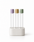 Blood work panel with three collection tubes in a white holder